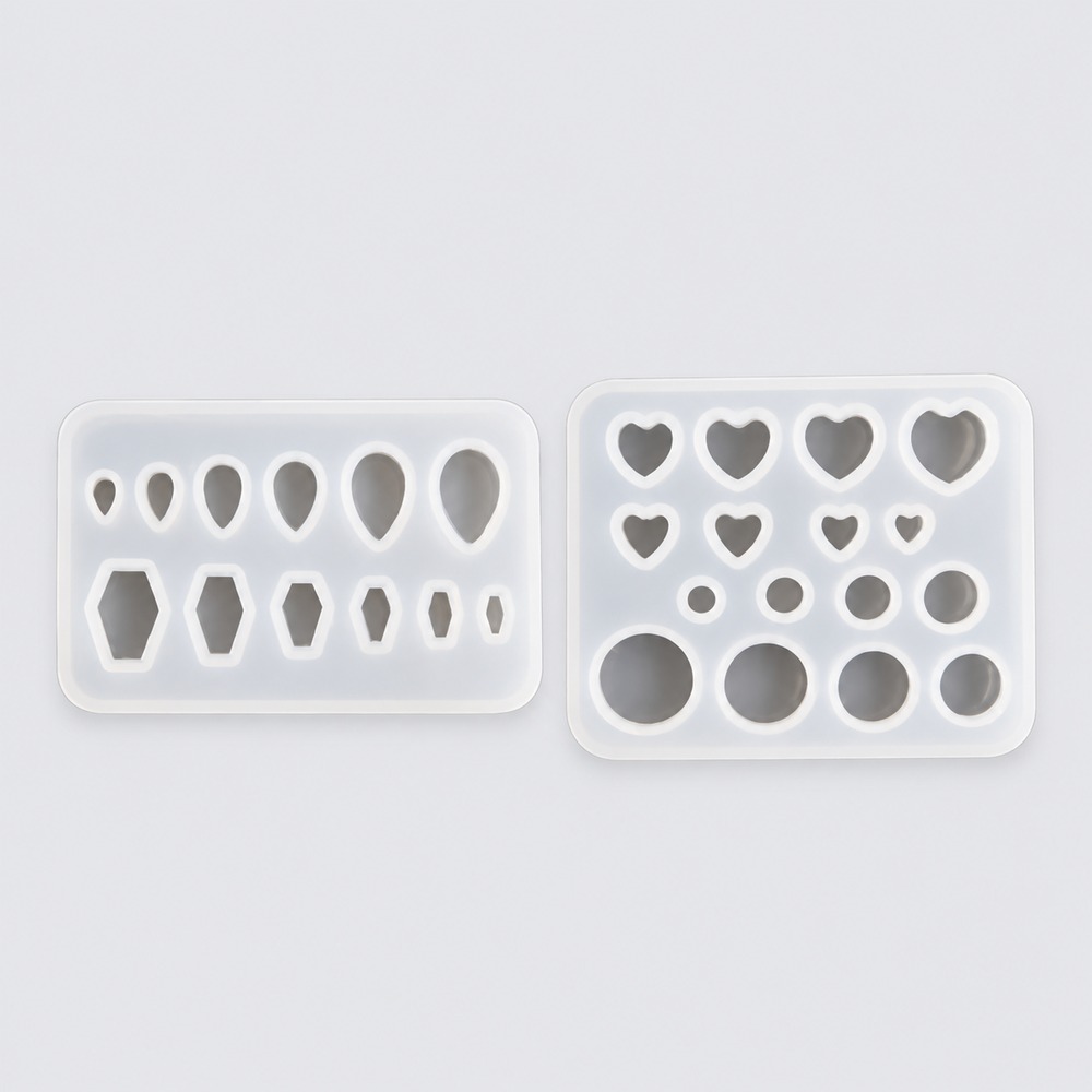 Memorial gauge moulds in round, heart, teardrop and coffin shapes.